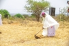 Askofu wa Jimbo Katoliki la Same, Mhashamu Rogath Kimario, akichimba msingi kuzindua ujenzi wa Groto ya Bikira Maria Mwombezi wa Wasafiri, kando ya Barabara ya Moshi-Arusha katika eneo la Maligo jimboni humo, wakati wa harambee ya kuchangia ujenzi huo.